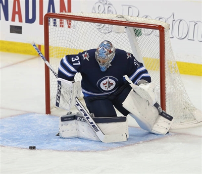 Connor Hellebuyck poster with hanger